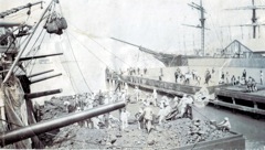 Coaling ship (whaling ship in background)